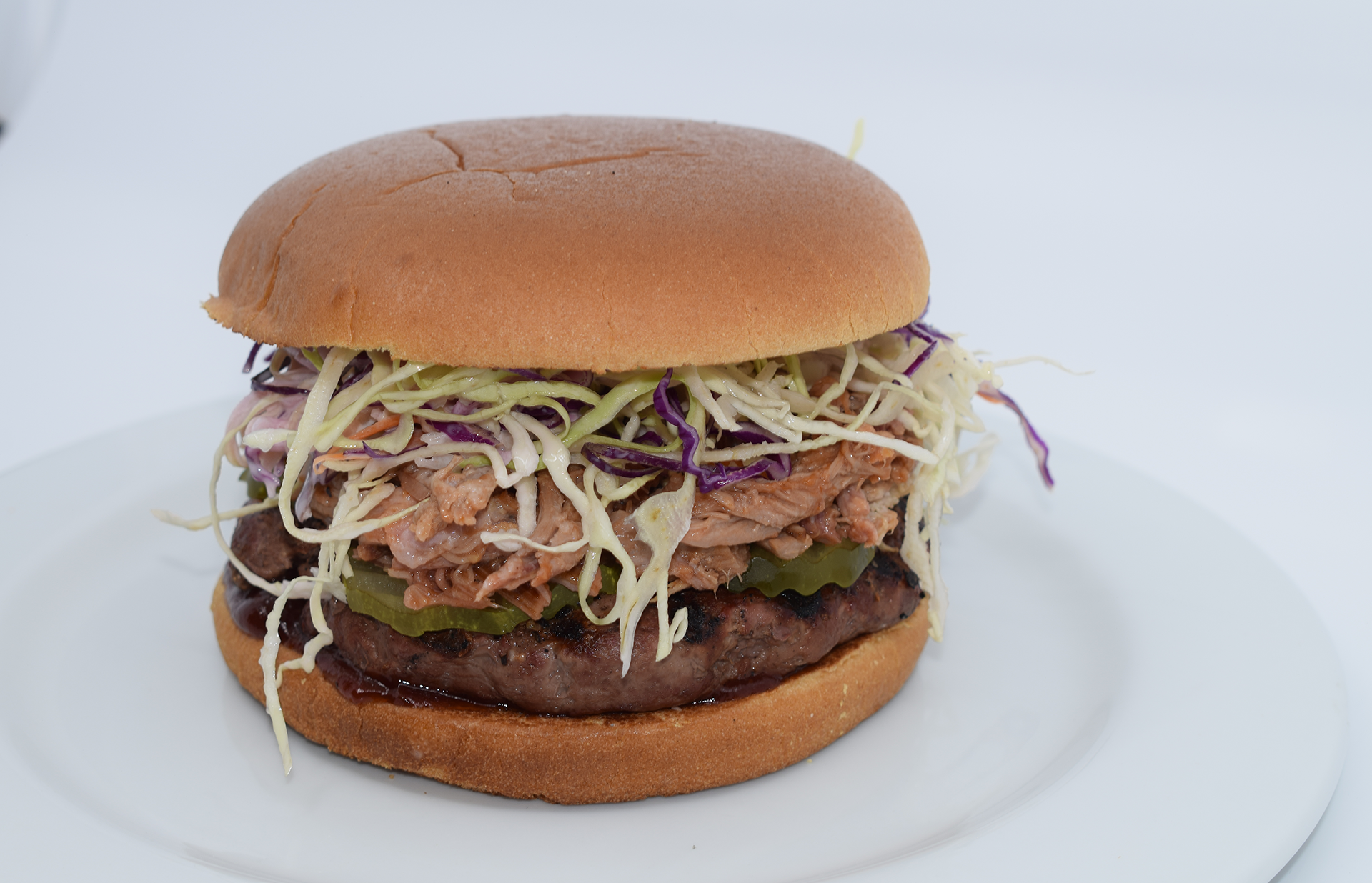 Order THE PULLED PORK BURGER food online from Mad House Comedy Club store, San Diego on bringmethat.com
