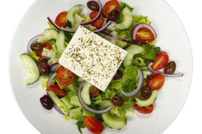 Order Greek Salad food online from Empanada Mama L.E.S. store, New York on bringmethat.com