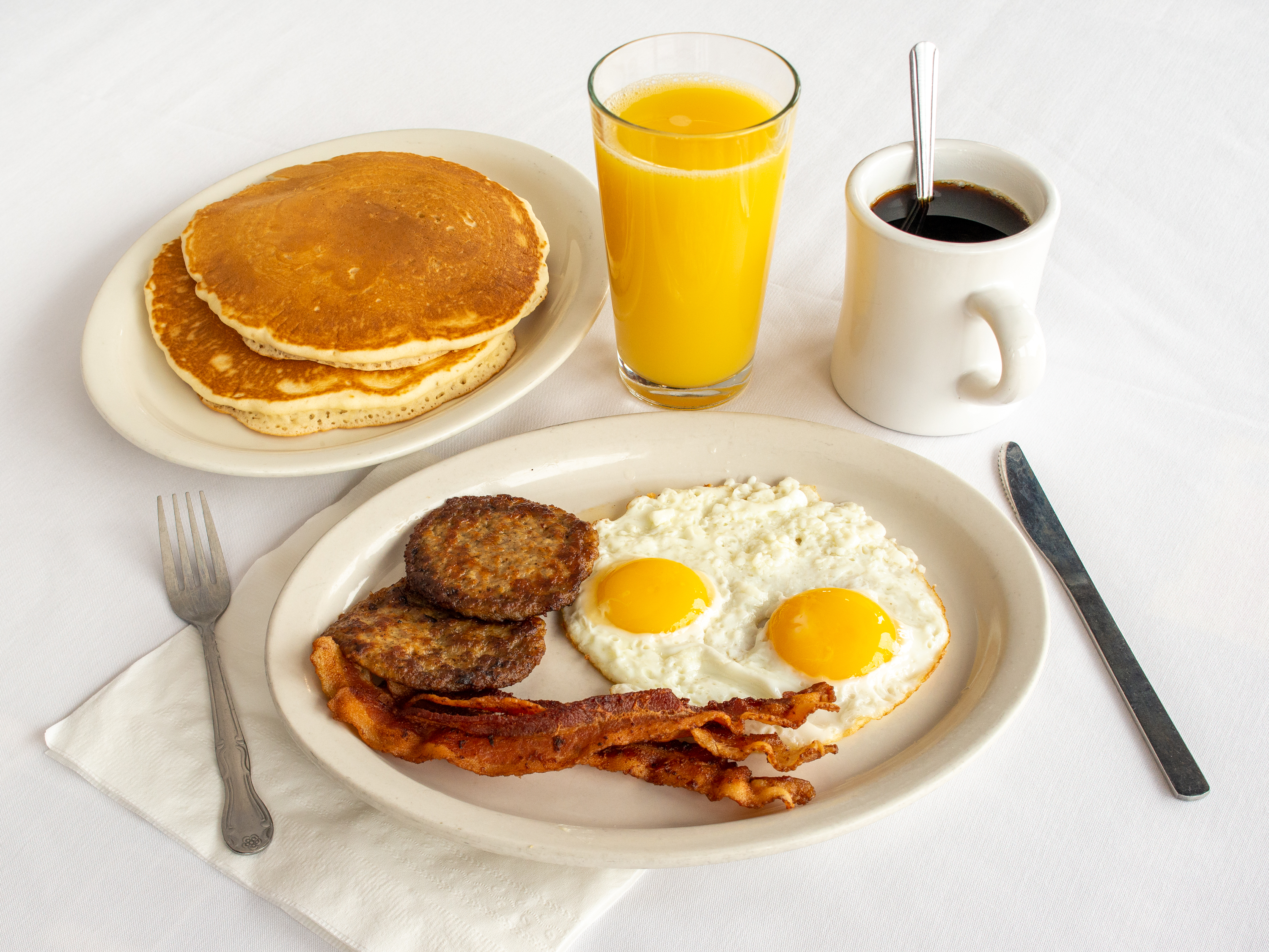 Order Pancake Combo food online from Good Day Cafe store, Arlington on bringmethat.com