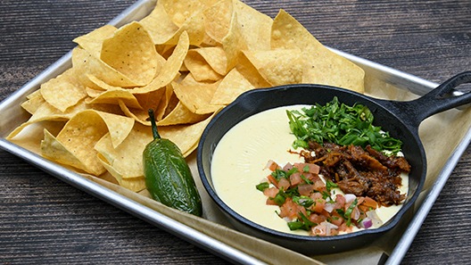 Order Queso Fresco with Brisket food online from Saltgrass Steak House store, Arlington on bringmethat.com