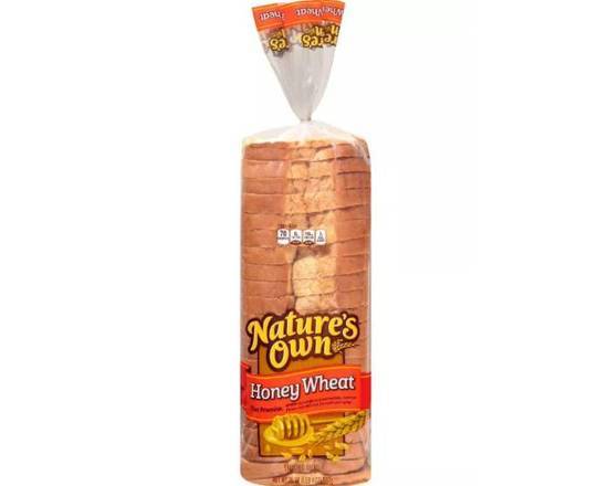 Order Nature's Own Bread Honey Wheat (20 oz) food online from Urban Value Corner Store store, Dallas on bringmethat.com