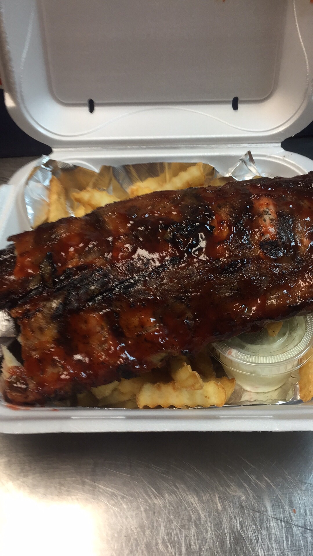 Order Capone's Famous BBQ Ribs food online from Capone's Pizzeria store, Bloomingdale on bringmethat.com