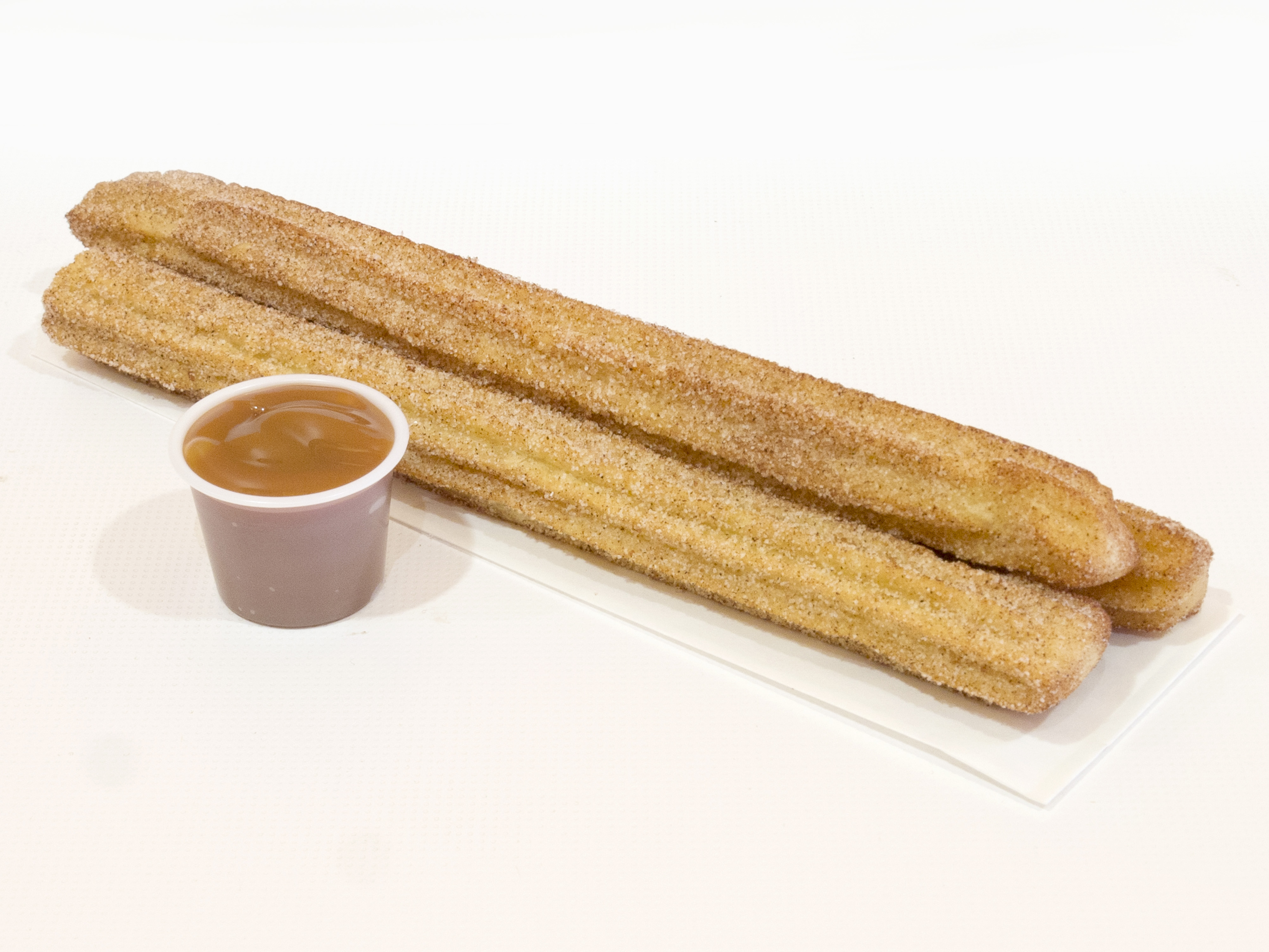 Order Churro with Caramel Sauce food online from Tappy Yogurt store, Lewisville on bringmethat.com