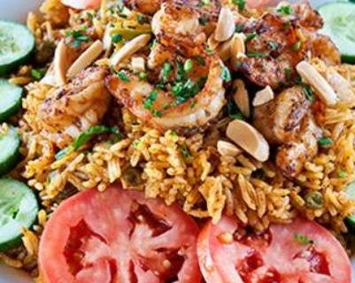 Order Shrimp Biryani with roasted nuts food online from Aladdin Cafe store, San Diego on bringmethat.com