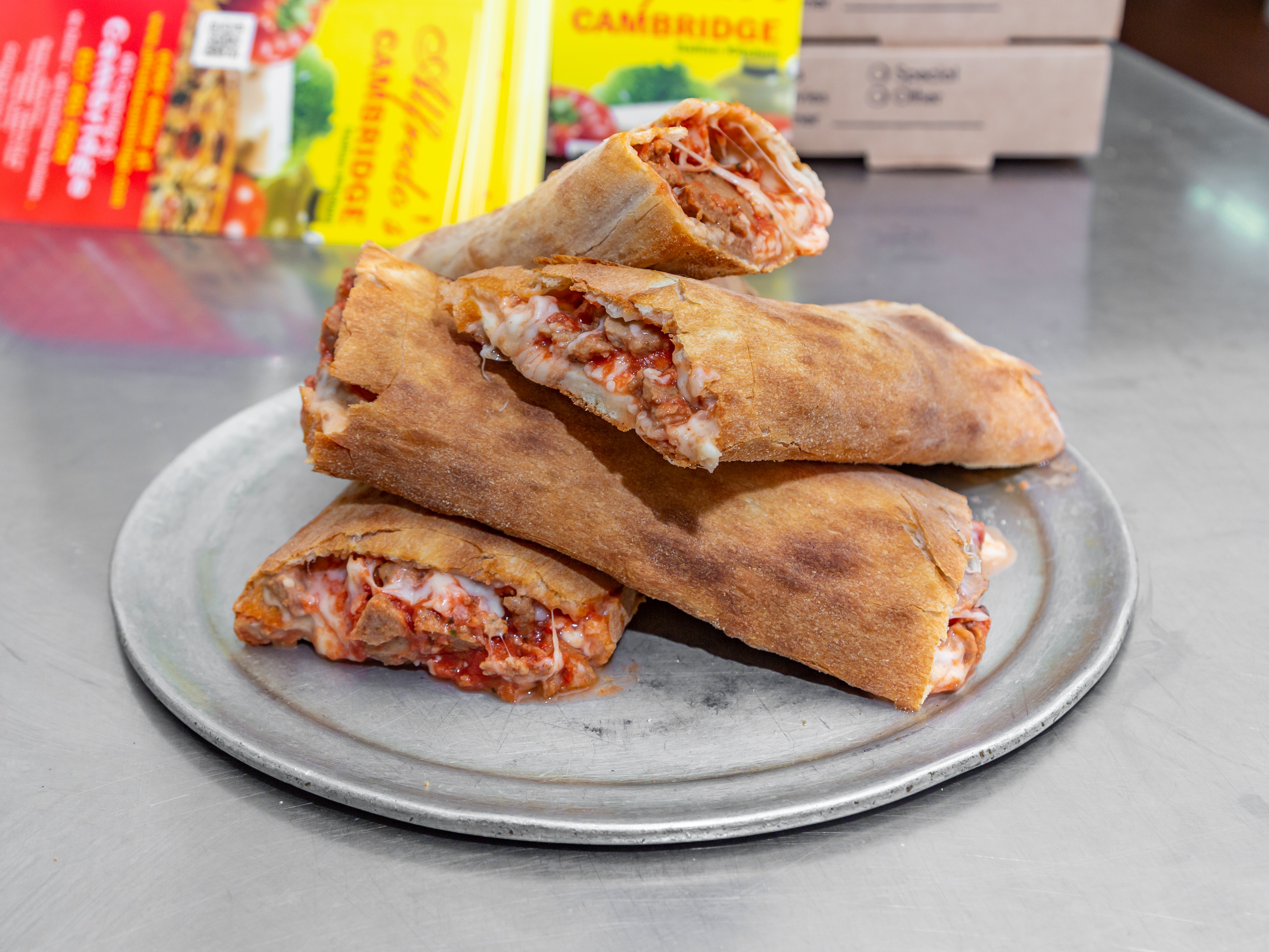 Order Meatball Parm Calzone food online from Alfredo's Italian Kitchen store, Cambridge on bringmethat.com