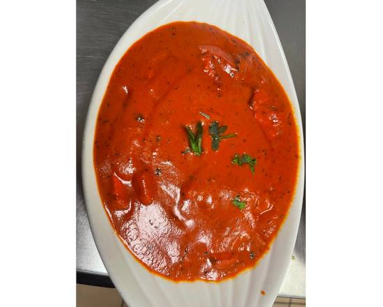 Order BUTTER CHICKEN  16 OZ food online from INDIAN GRILL RESTAURANT store, Norcross on bringmethat.com
