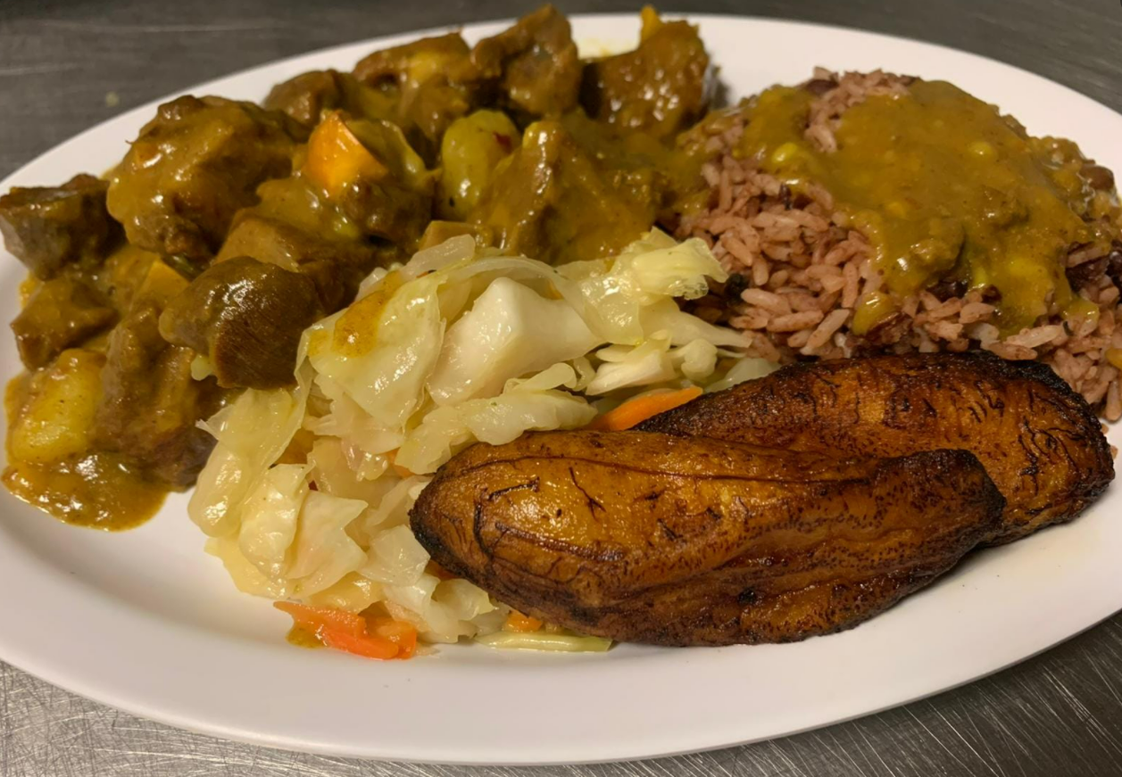 Order Curry Goat Dinner food online from Yaad Style Jamaican Cuisine store, Portland on bringmethat.com