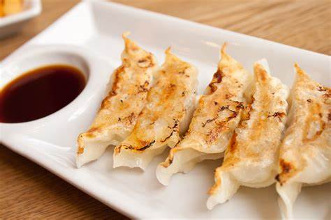 Order M44. Gyoza (6 ct) food online from Haunted House Restaurant store, Omaha on bringmethat.com