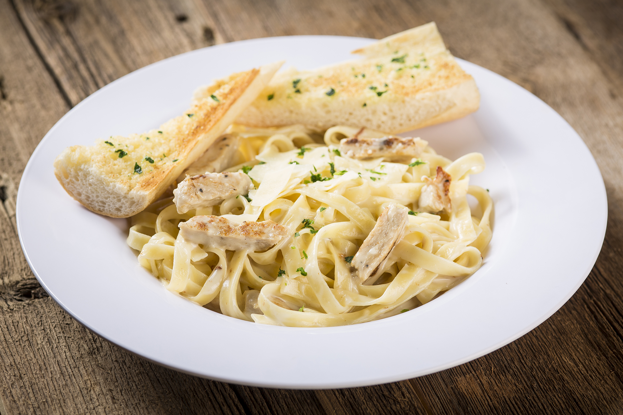 Order Chicken Fettuccini Alfredo Pasta food online from Papa Saverios Pizzeria store, West Chicago on bringmethat.com