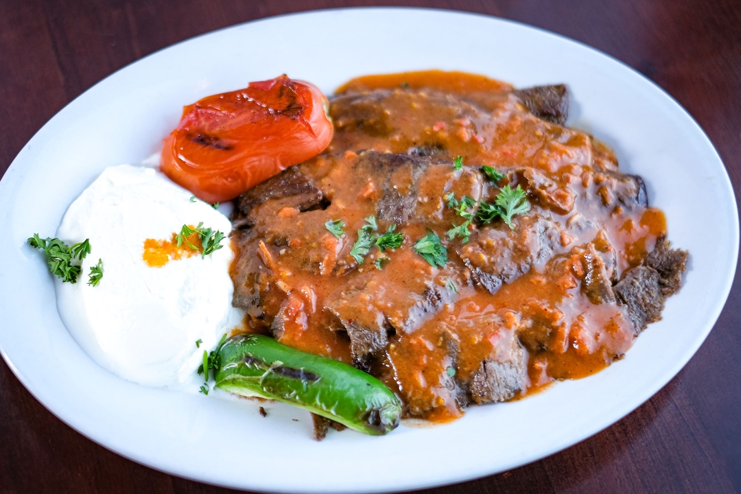 Order Iskender food online from Anatolia Cafe store, Cleveland Heights on bringmethat.com