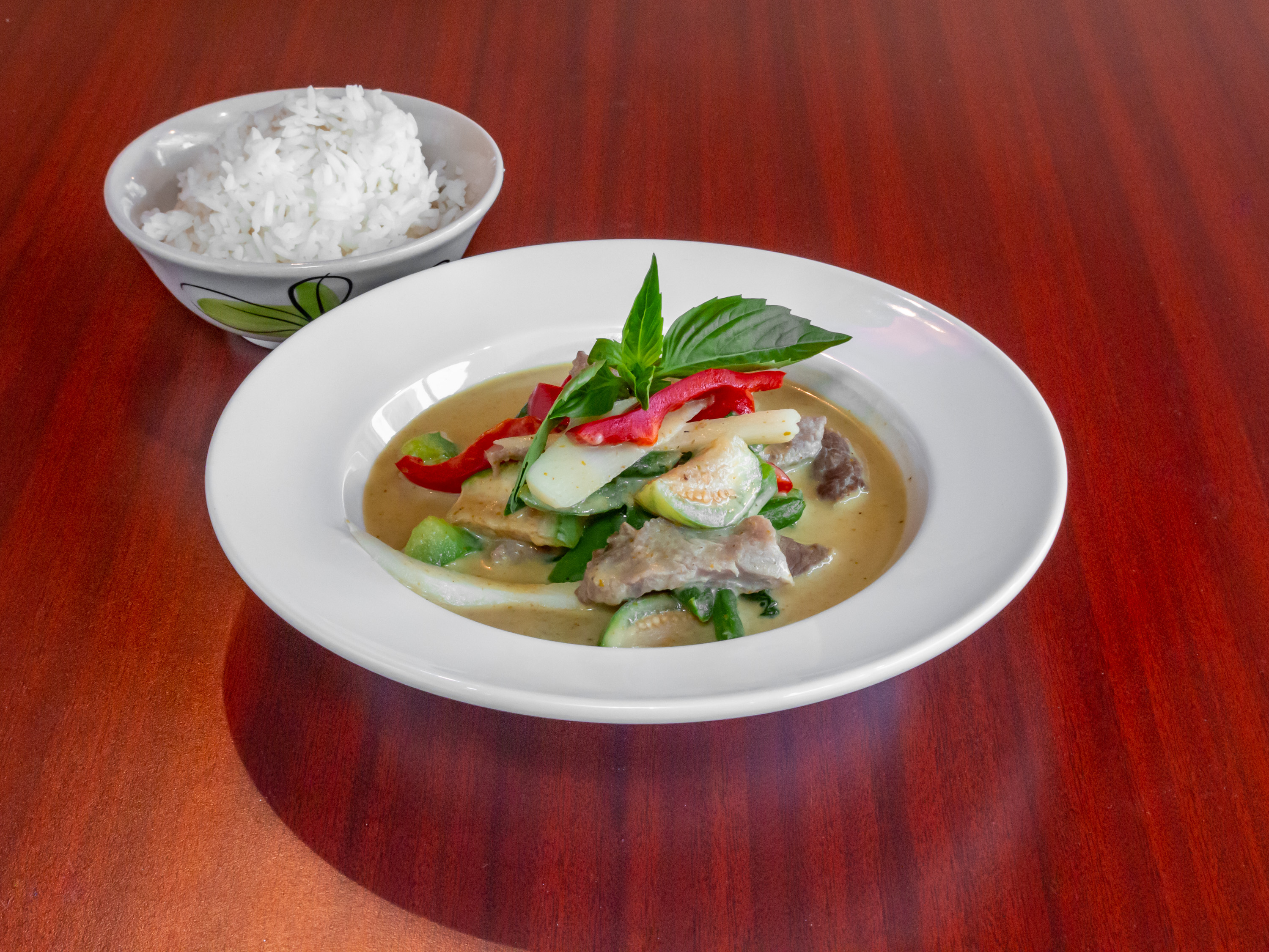 Order Green Curry food online from Real Thai Restaurant store, Chicago on bringmethat.com
