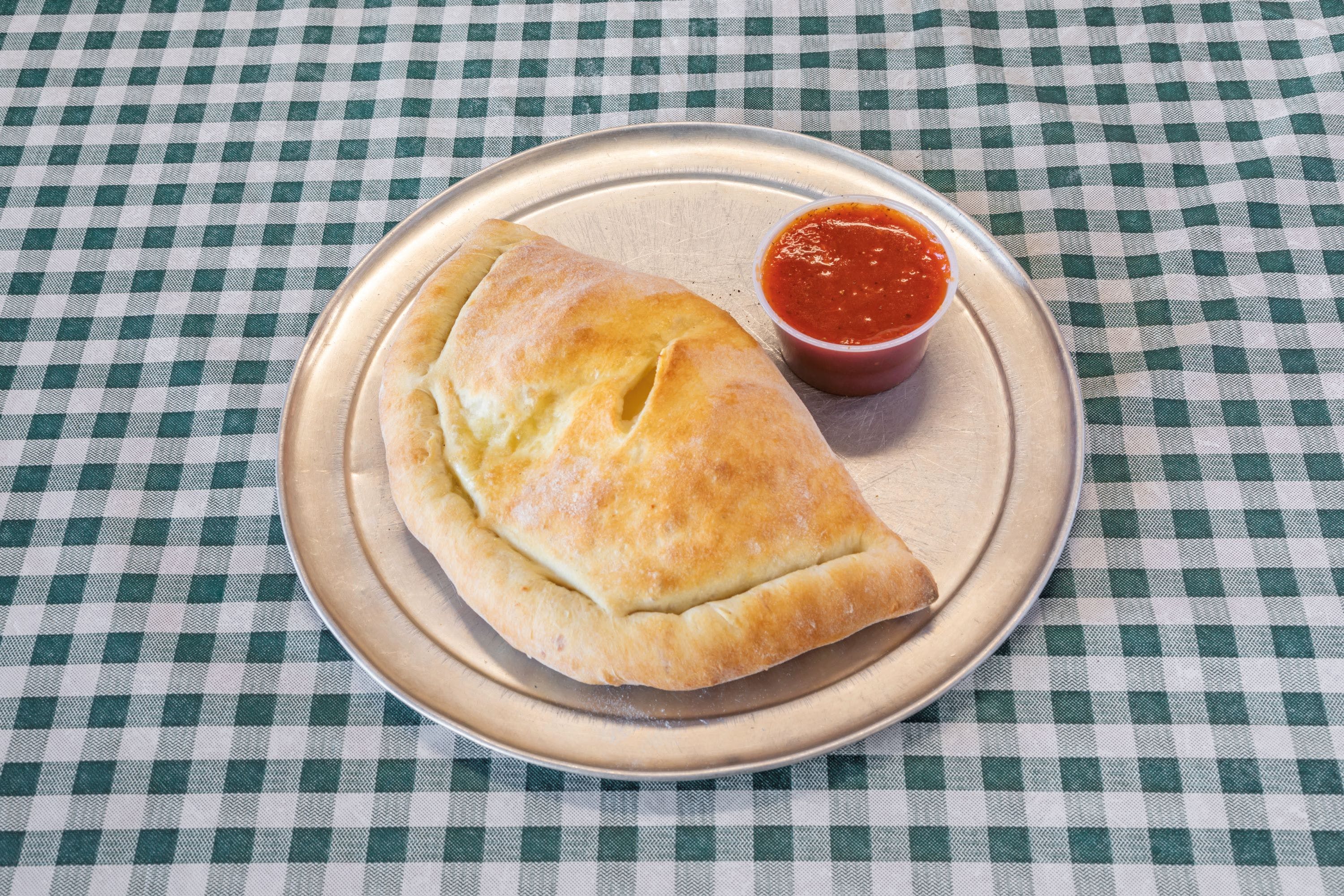 Order Cheese Calzone - Calzone food online from Pats Pizza Plus store, Phoneix on bringmethat.com