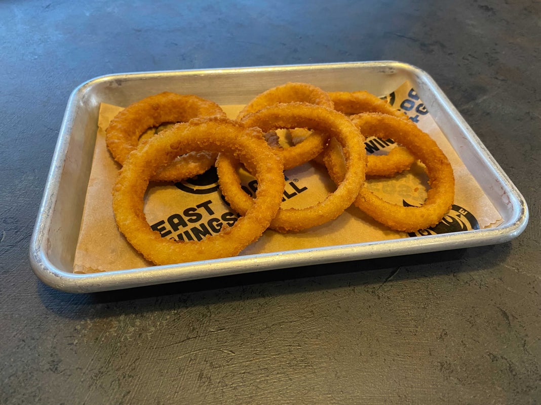 Order Side of Onion Rings food online from East Coast Wings + Grill store, High Point on bringmethat.com