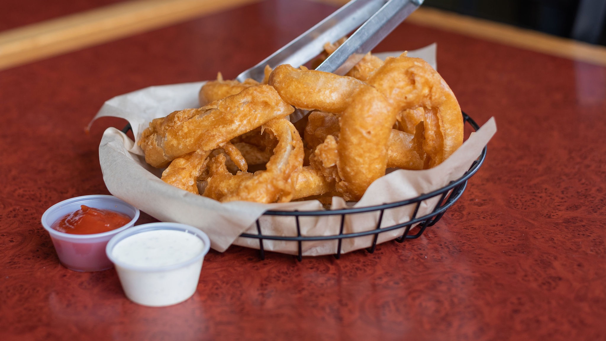 Order Basket O'rings  food online from Wild River Brewing & Pizza store, Medford on bringmethat.com