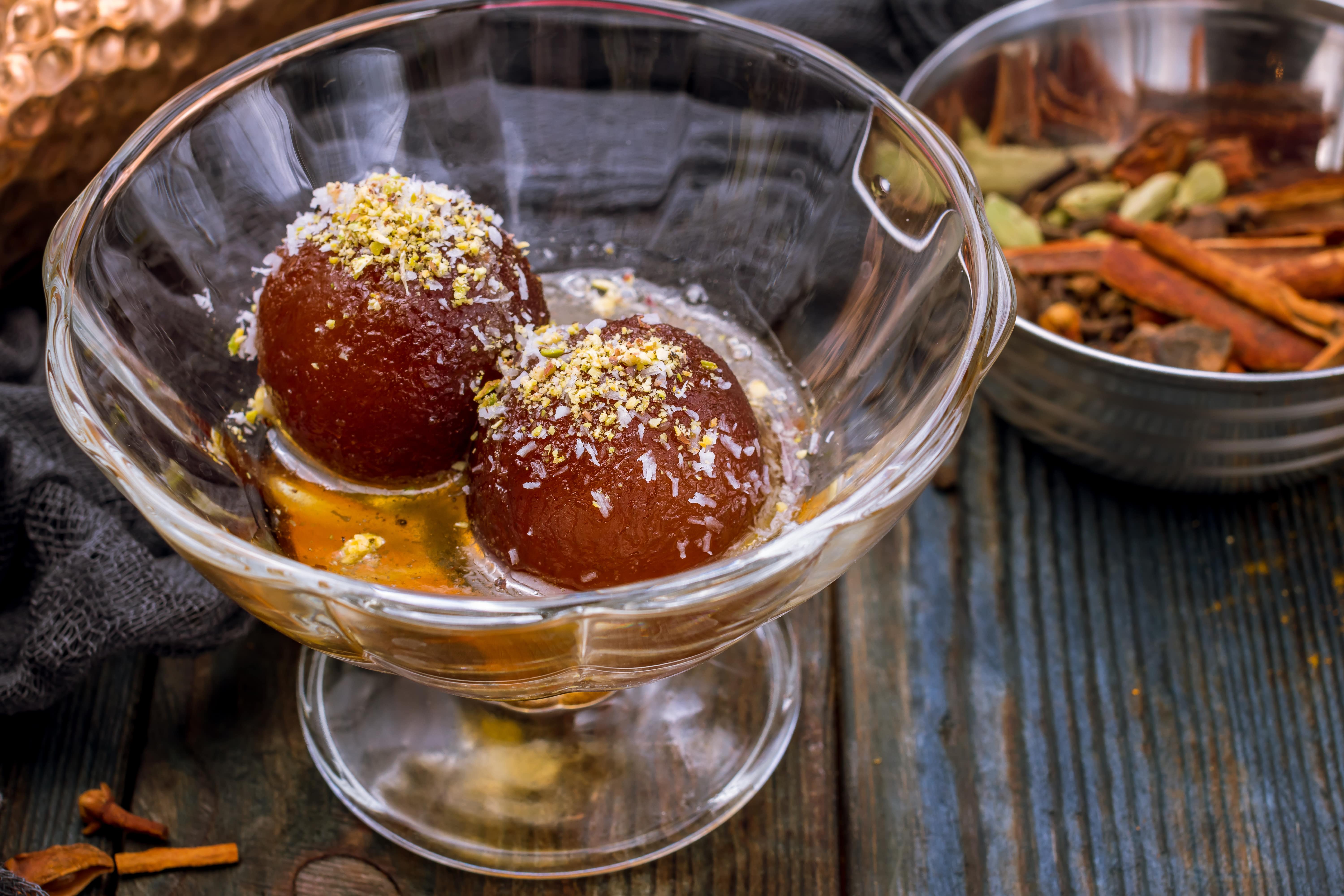 Order Gulab Jamun food online from Tropical Curry And Grill store, Pflugerville on bringmethat.com