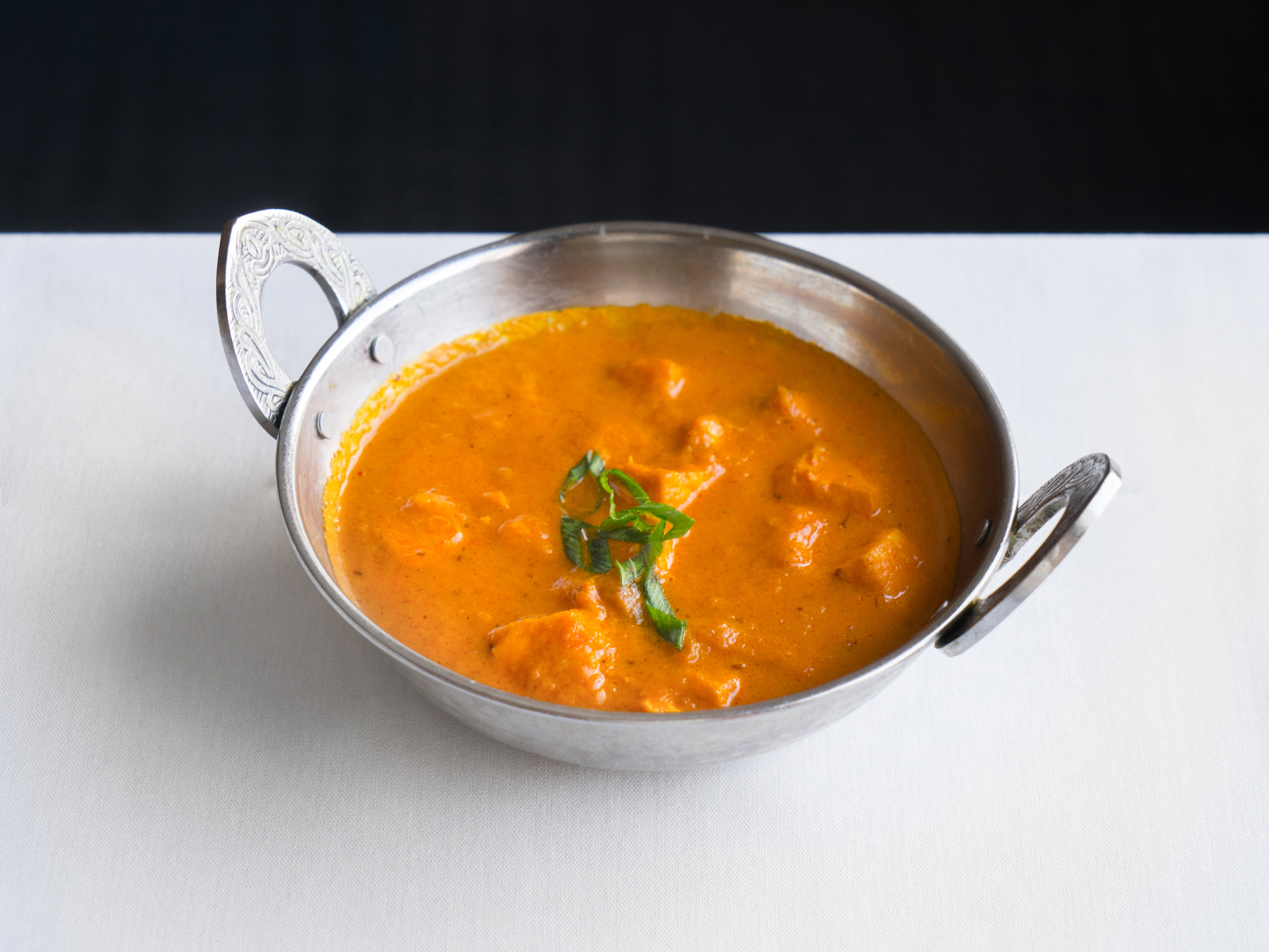 Order Chicken Makhani food online from India Palace store, Burnsville on bringmethat.com