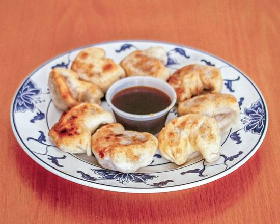 Order Steamed or Fried Dumpling (8 pcs) food online from Silver Palace store, Portsmouth on bringmethat.com