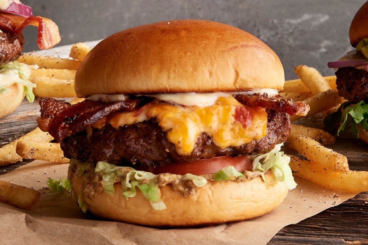 Order Billionaire's Bacon Burger food online from Twin Peaks Restaurant store, Oklahoma City on bringmethat.com