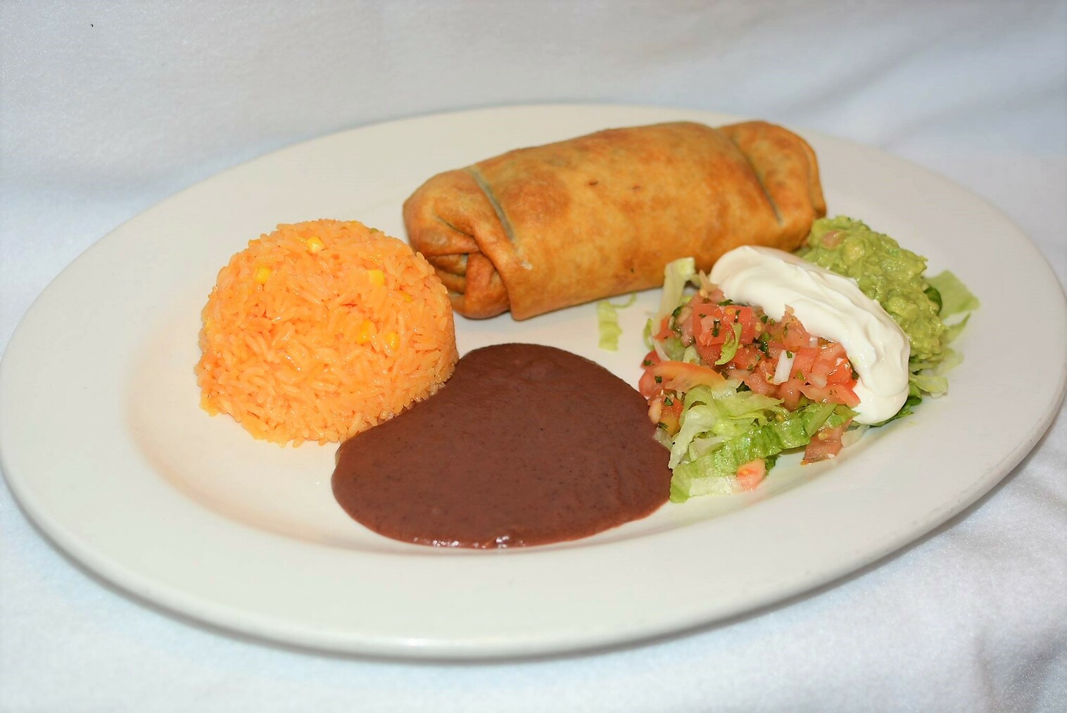 Order Shredded Beef Chimichang food online from El Rinconcito Cafe store, Washington on bringmethat.com