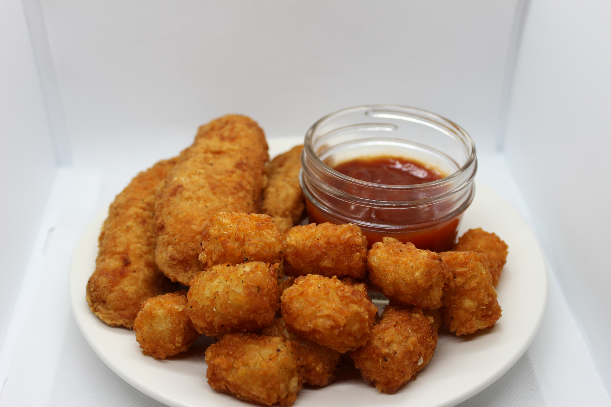 Order Kid's 2 Chicken Tenders with Tater Tots food online from Two Mamas' Gourmet Pizzeria store, Prescott on bringmethat.com