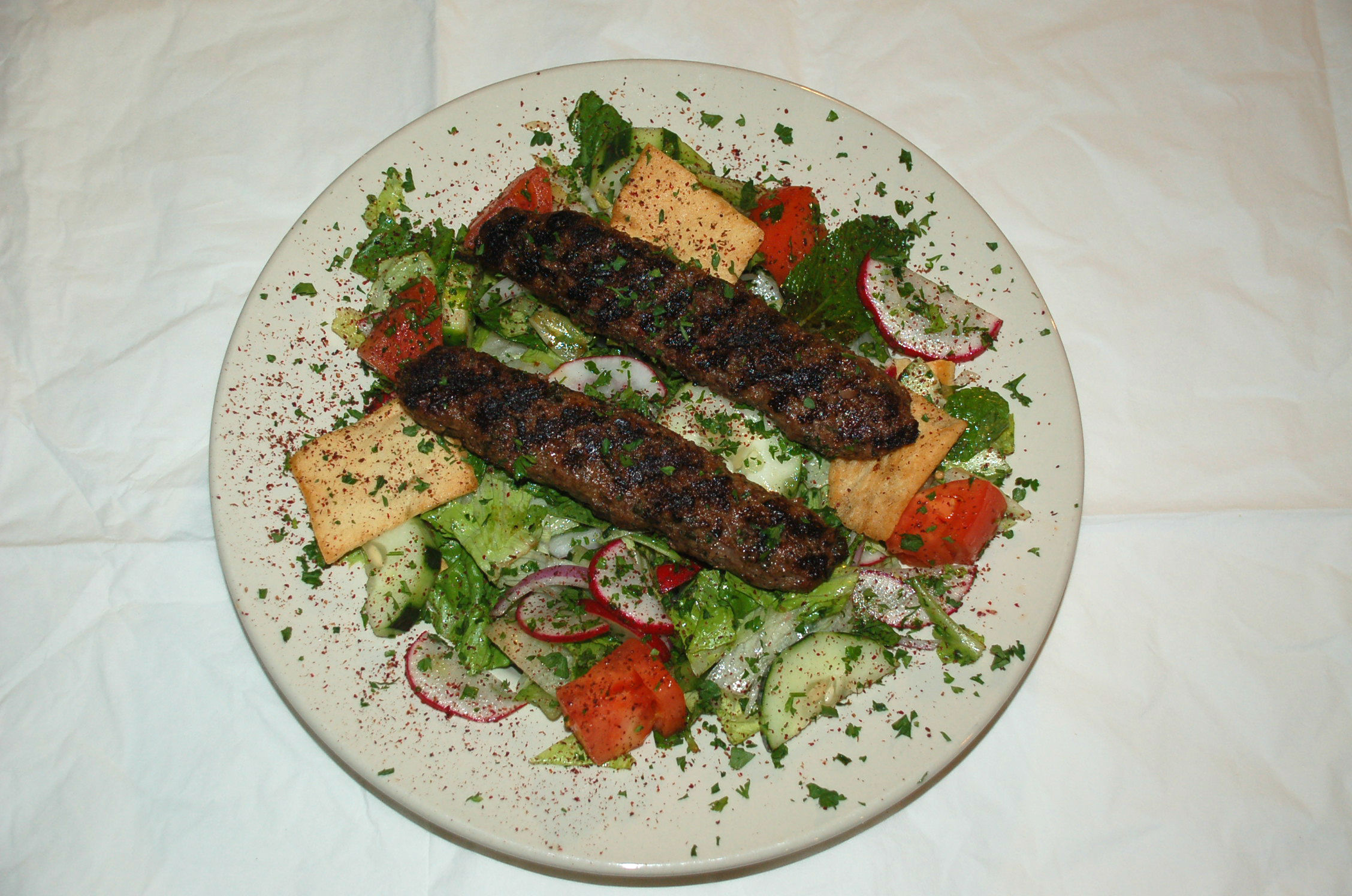 Order Kafta Kabob Salad food online from Micho'z Fresh Lebanese Grill store, San Diego on bringmethat.com