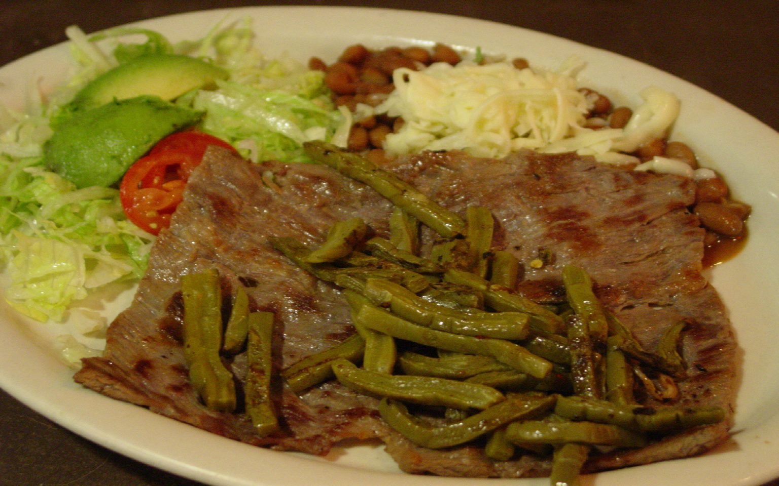 Order 1. Perico's Plate food online from Perico's Mexican Cafe & Bar store, Houston on bringmethat.com