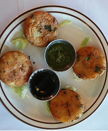 Order Aloo Tikki food online from Taste Of India Grill store, Bountiful on bringmethat.com