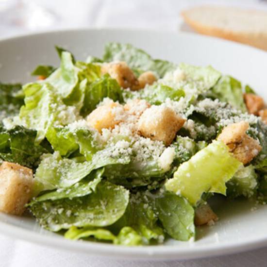 Order Caesar Salad food online from Mario's Pizza store, Greensboro on bringmethat.com