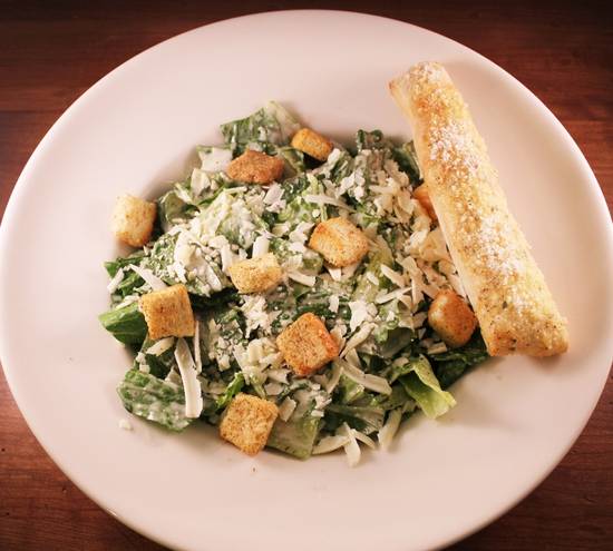 Order Caesar Salad* food online from Uccello Ristorante store, Grand Rapids on bringmethat.com