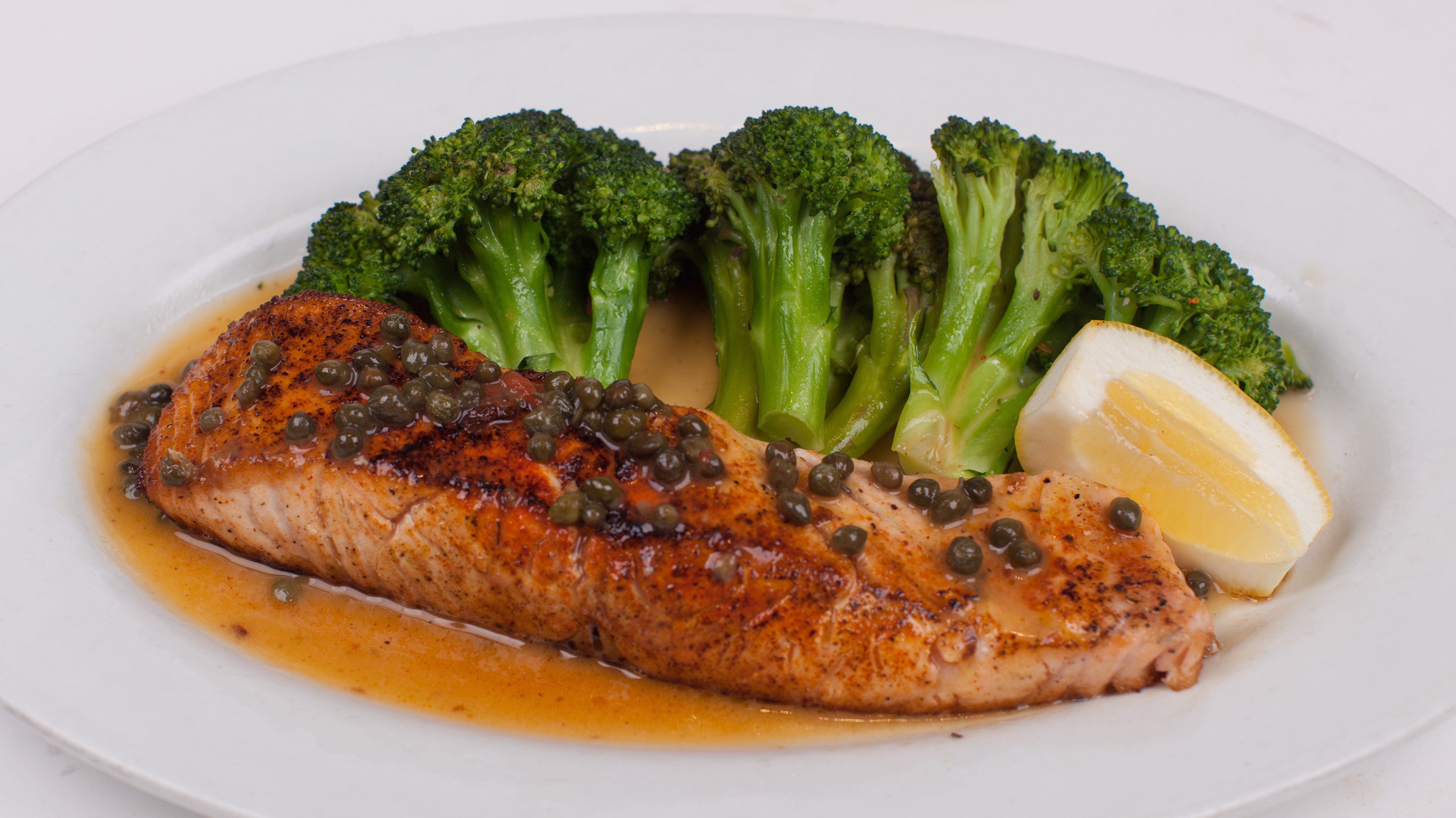 Order Salmon Piccata food online from Umberto's Pizzeria store, New Hyde Park on bringmethat.com