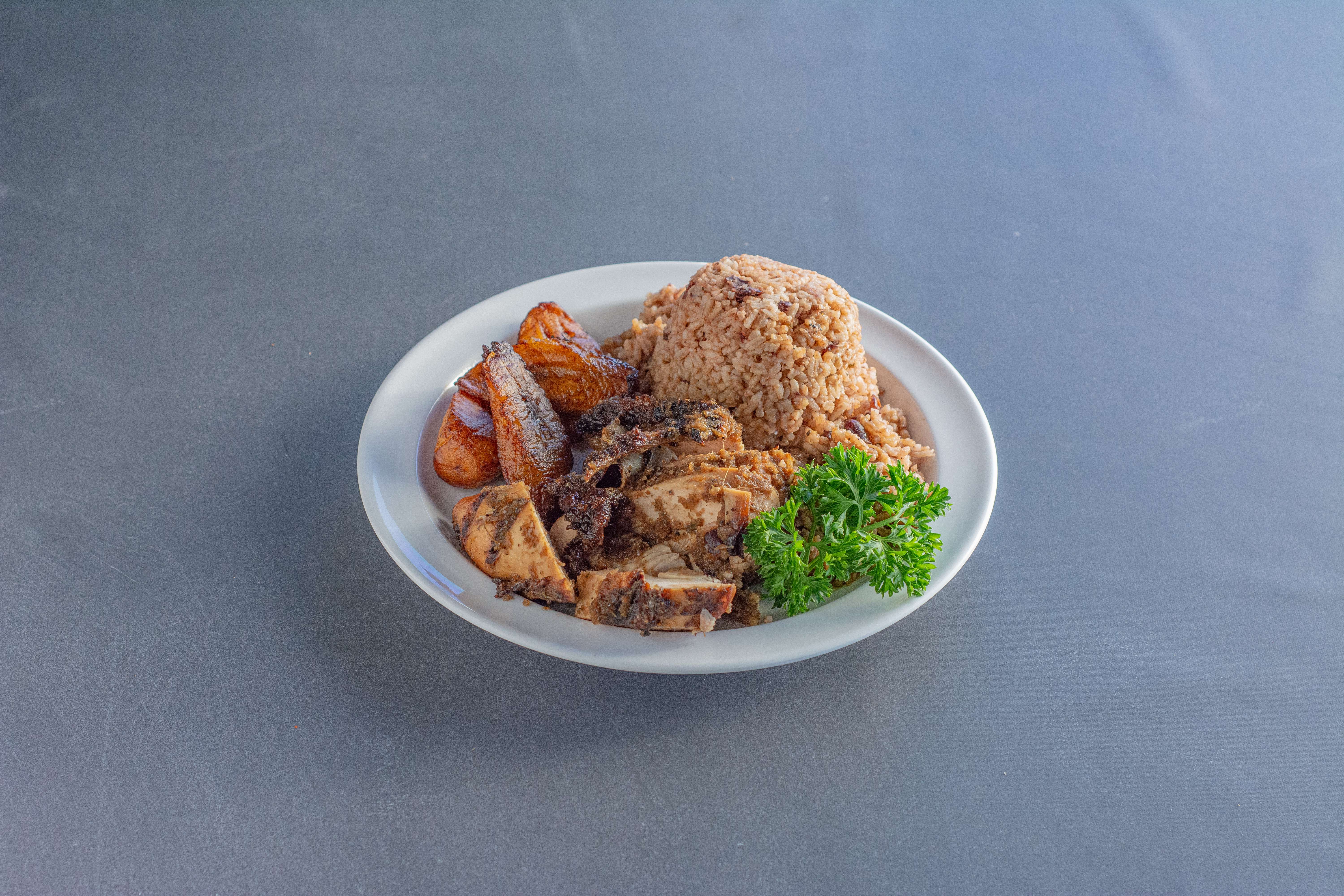 Order Jerk Chicken food online from Flavas Jamaican Grill store, South San Francisco on bringmethat.com