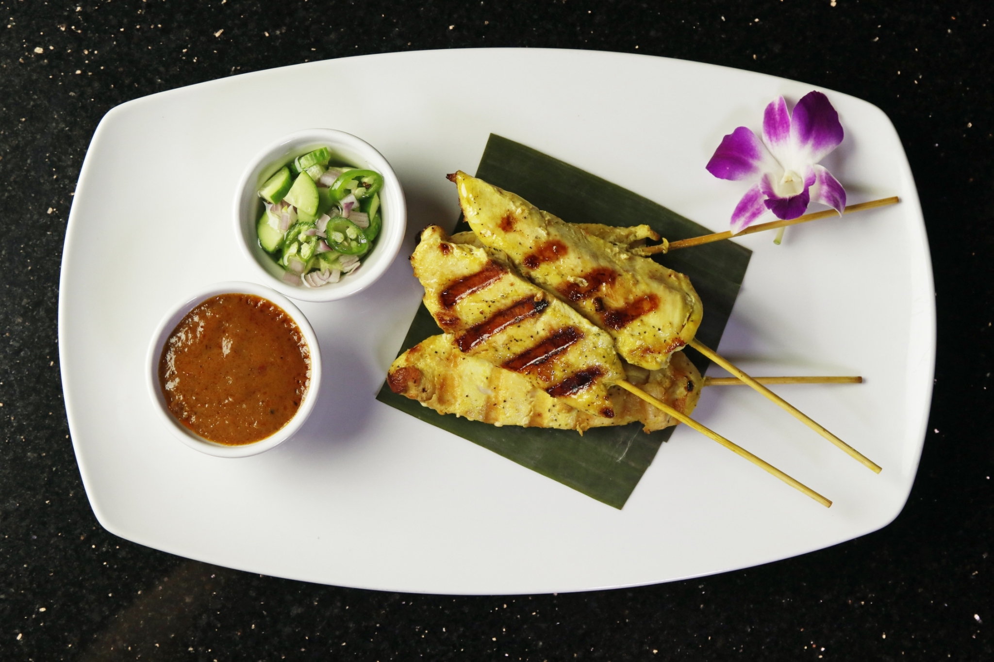 Order 4 Pieces Chicken Satay (GF) food online from Savory Thai store, Oceanside on bringmethat.com