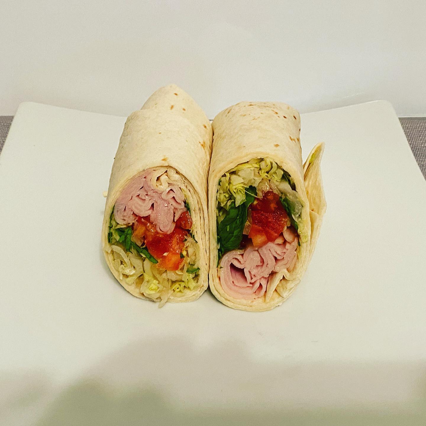 Order Turkey Bistro Wrap food online from Pineapple Xpressed Cafe store, McHenry on bringmethat.com