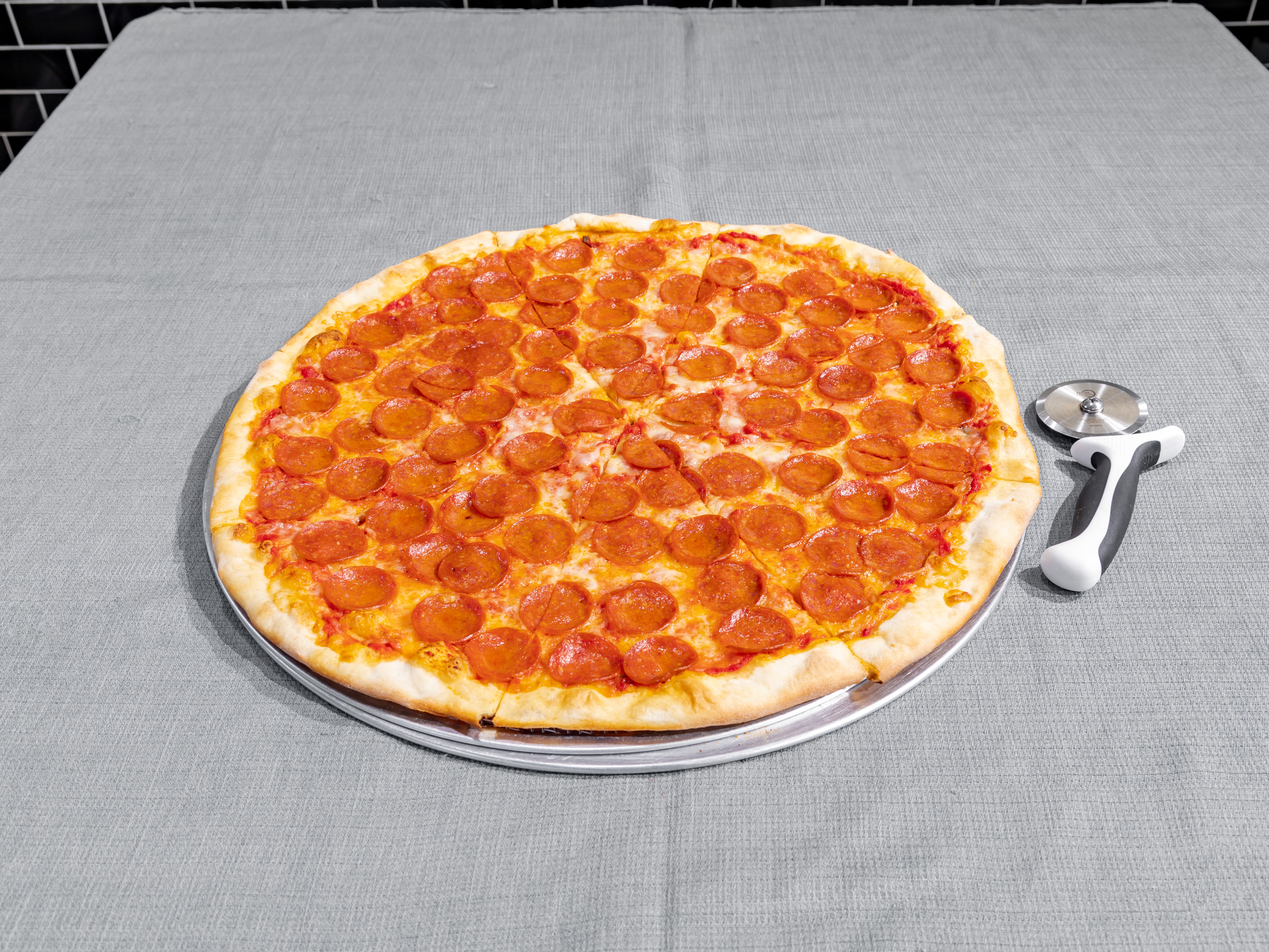 Order Pepperoni Pizza Pie food online from Carnegie Pizza store, New York on bringmethat.com