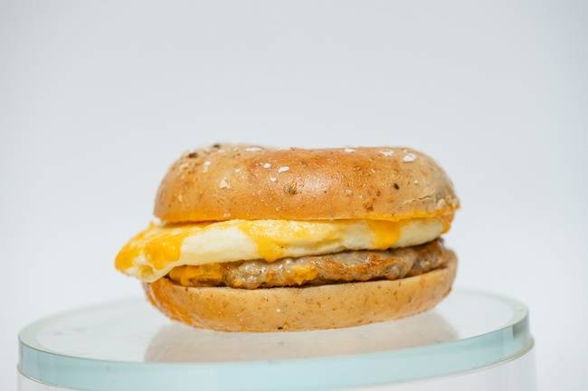 Order Sausage, Egg & Cheddar Cheese NY Style Everything Bagel food online from The Human Bean store, Canby on bringmethat.com