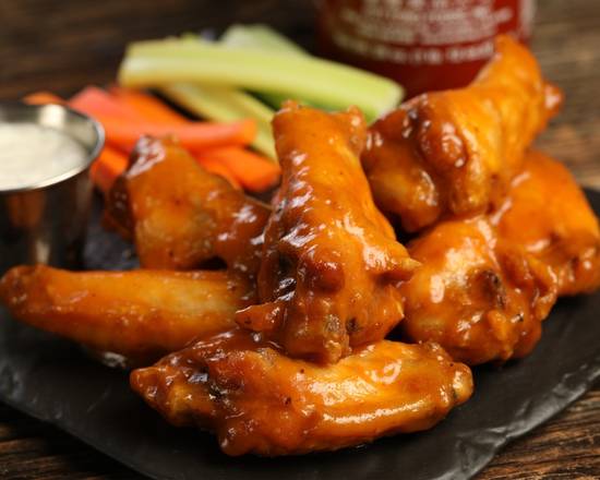 Order Traditional Sriracha Mango food online from Wild Wild Wings store, Bloomington on bringmethat.com