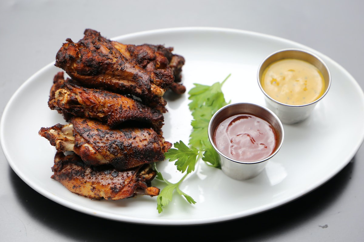 Order SMOKED CHICKEN WINGS food online from City Works store, Pittsburgh on bringmethat.com