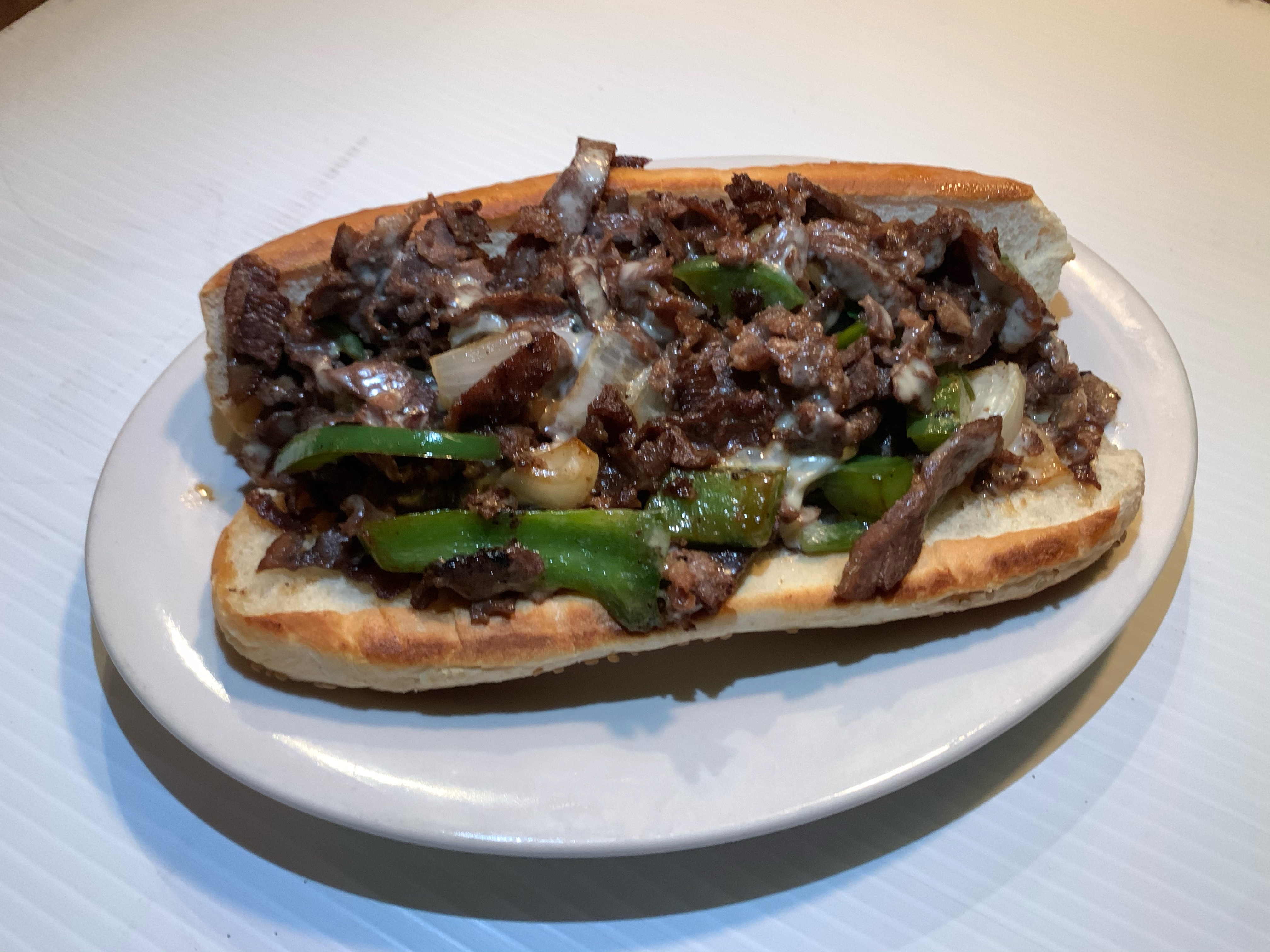 Order Philly Cheese Steak food online from Irish Coffee Bar & Grill store, Grosse Pointe on bringmethat.com
