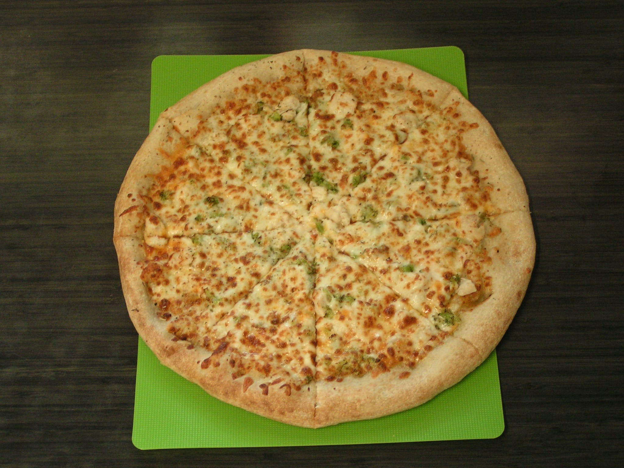 Order CHICKEN BROCCOLI CHEDDAR - 8"  PERSONAL food online from Pepperinos Pizza store, Lewistown on bringmethat.com