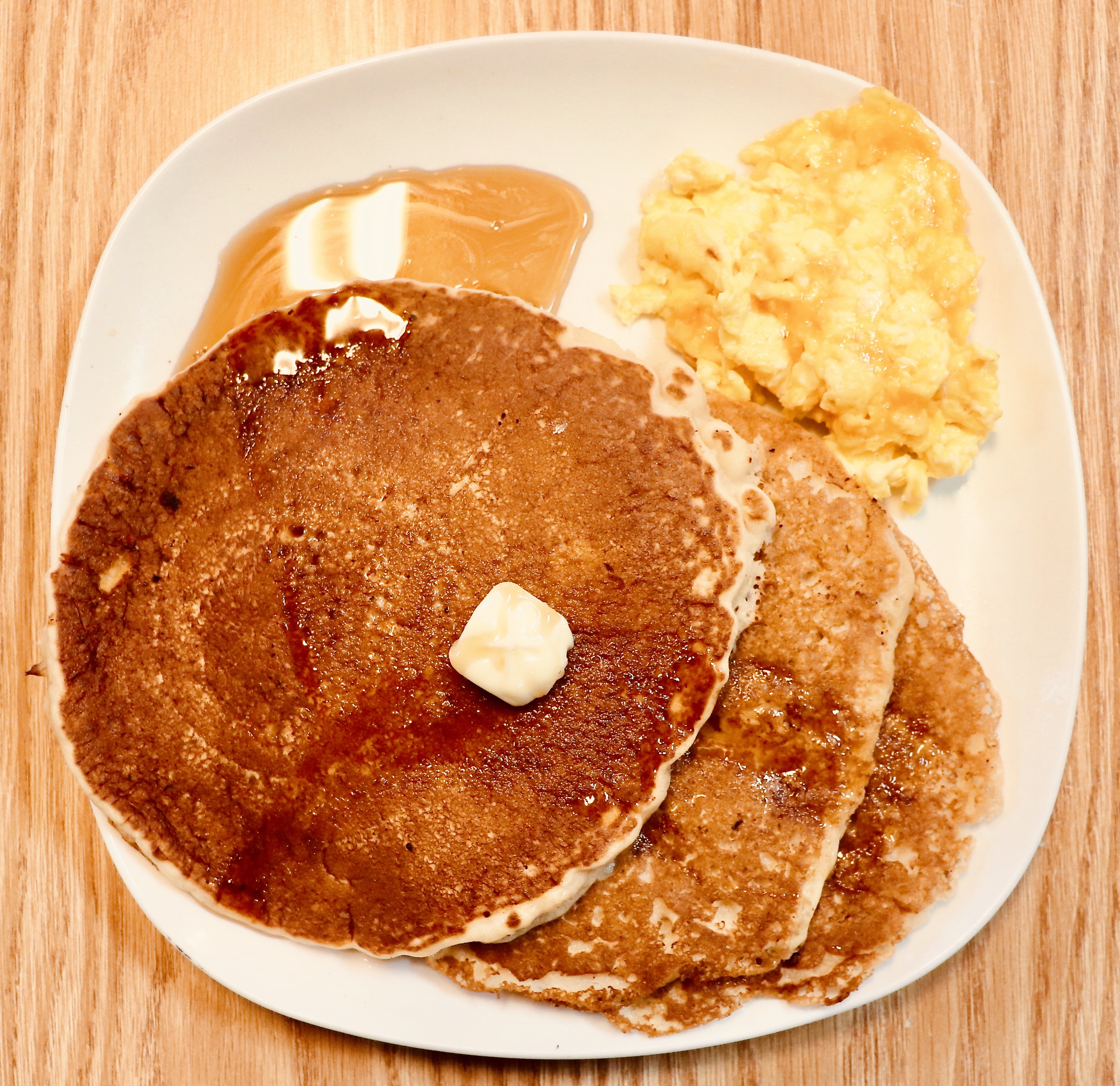 Order Pancake with 2 Eggs food online from Charlie Cafe store, Norfolk on bringmethat.com