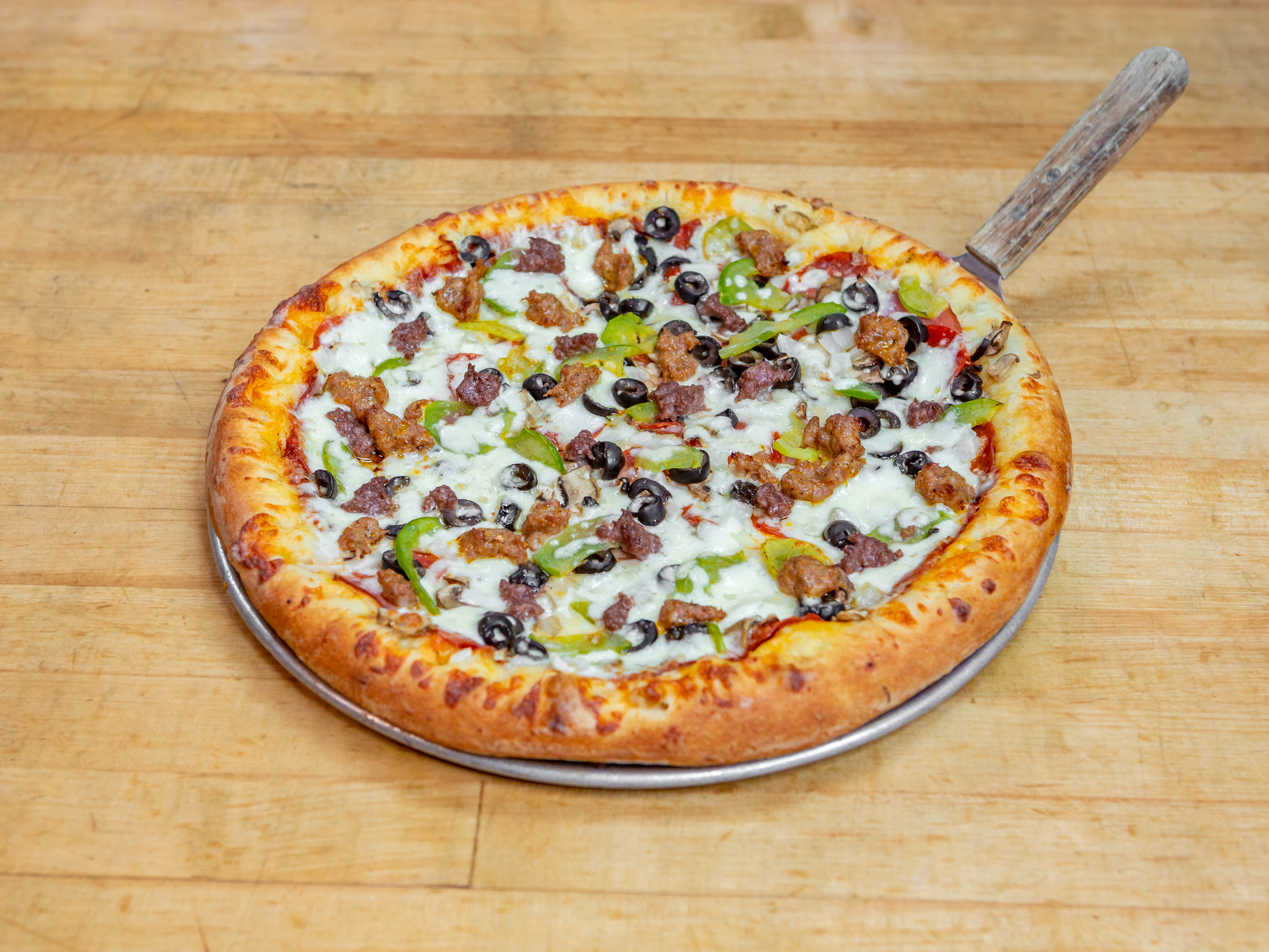 Order The Chef's Mistake Specialty Pizza food online from Guidos Pizza store, Anchorage on bringmethat.com
