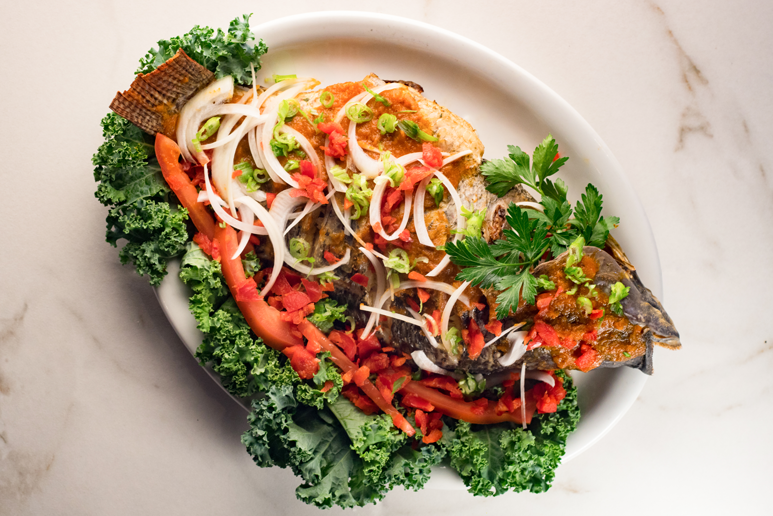 Order Grilled Tilapia food online from Cafe Songhai store, Norcross on bringmethat.com