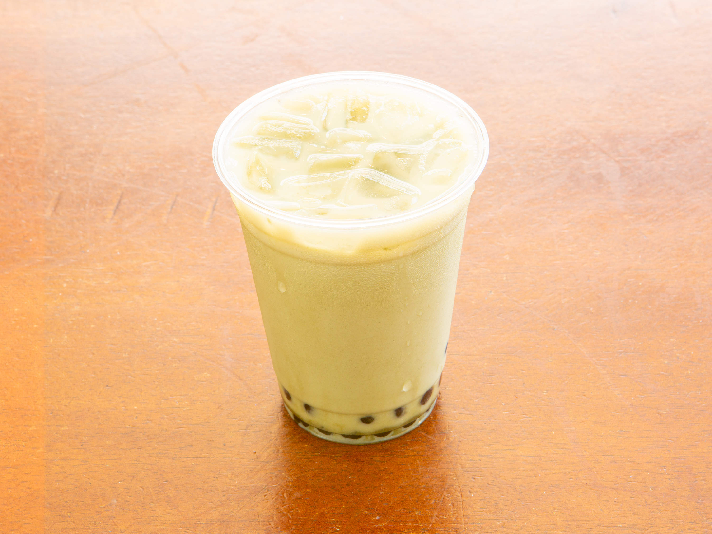 Order 3. Matcha Milk Tea food online from Laughing Tiger Tea House store, Santa Barbara on bringmethat.com