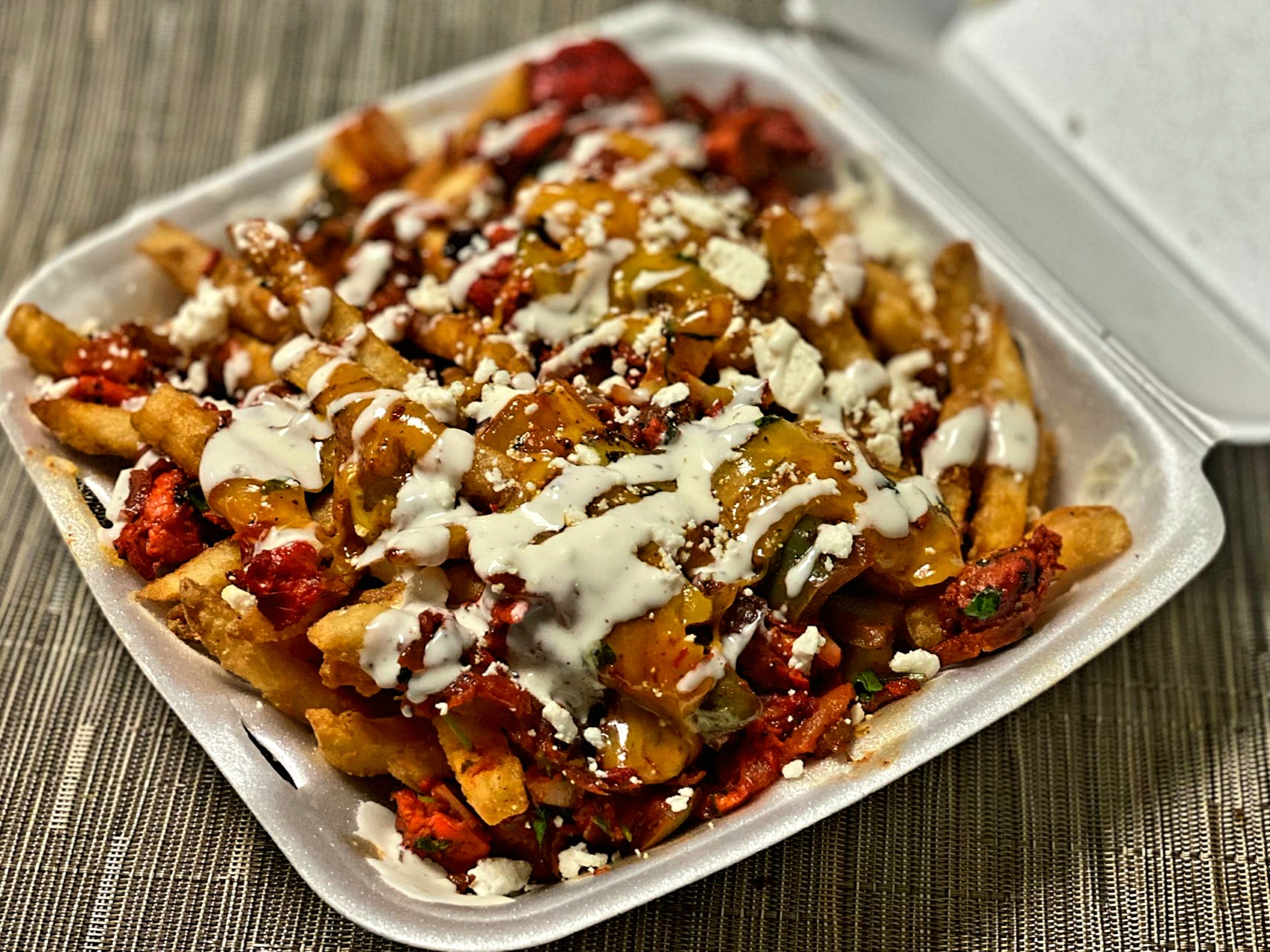 Order Loaded Fries food online from Jasmine Fusion Grill store, Columbus on bringmethat.com
