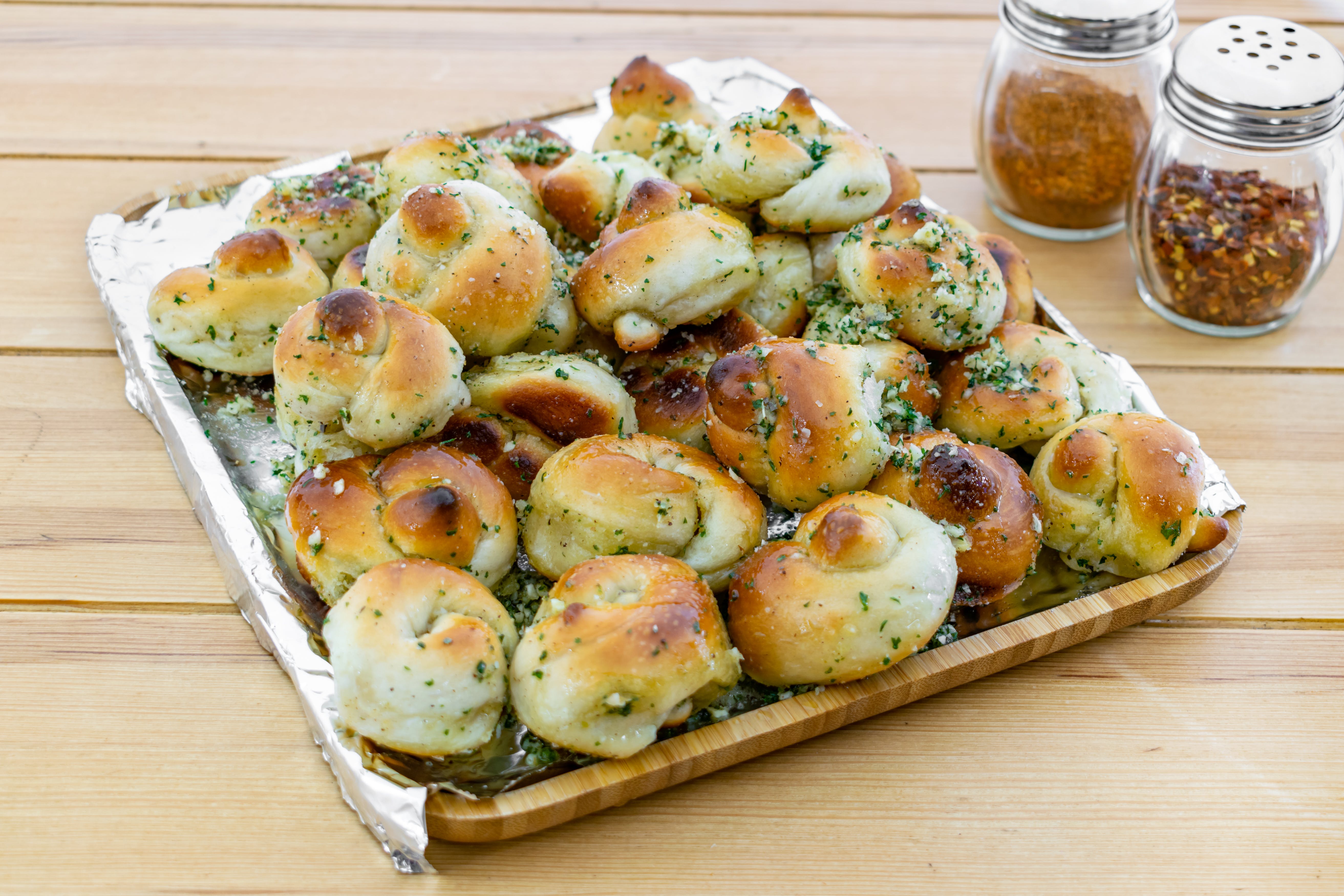 Order Garlic Knots - 6 Pieces food online from Fratelli Pizza & Coffee store, Wayne on bringmethat.com