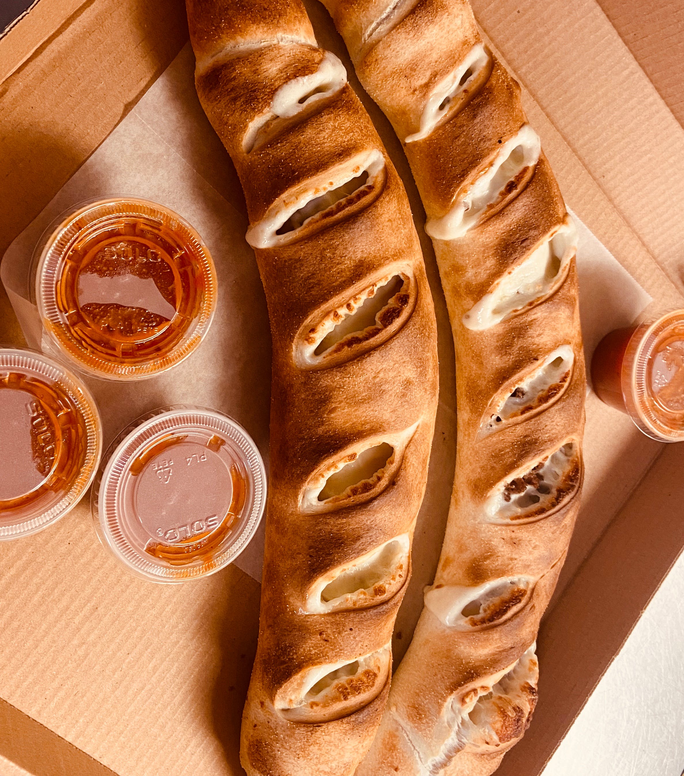 Order Steak Stromboli Special - Small food online from Bejta's Pizza & Subs store, Greensboro on bringmethat.com