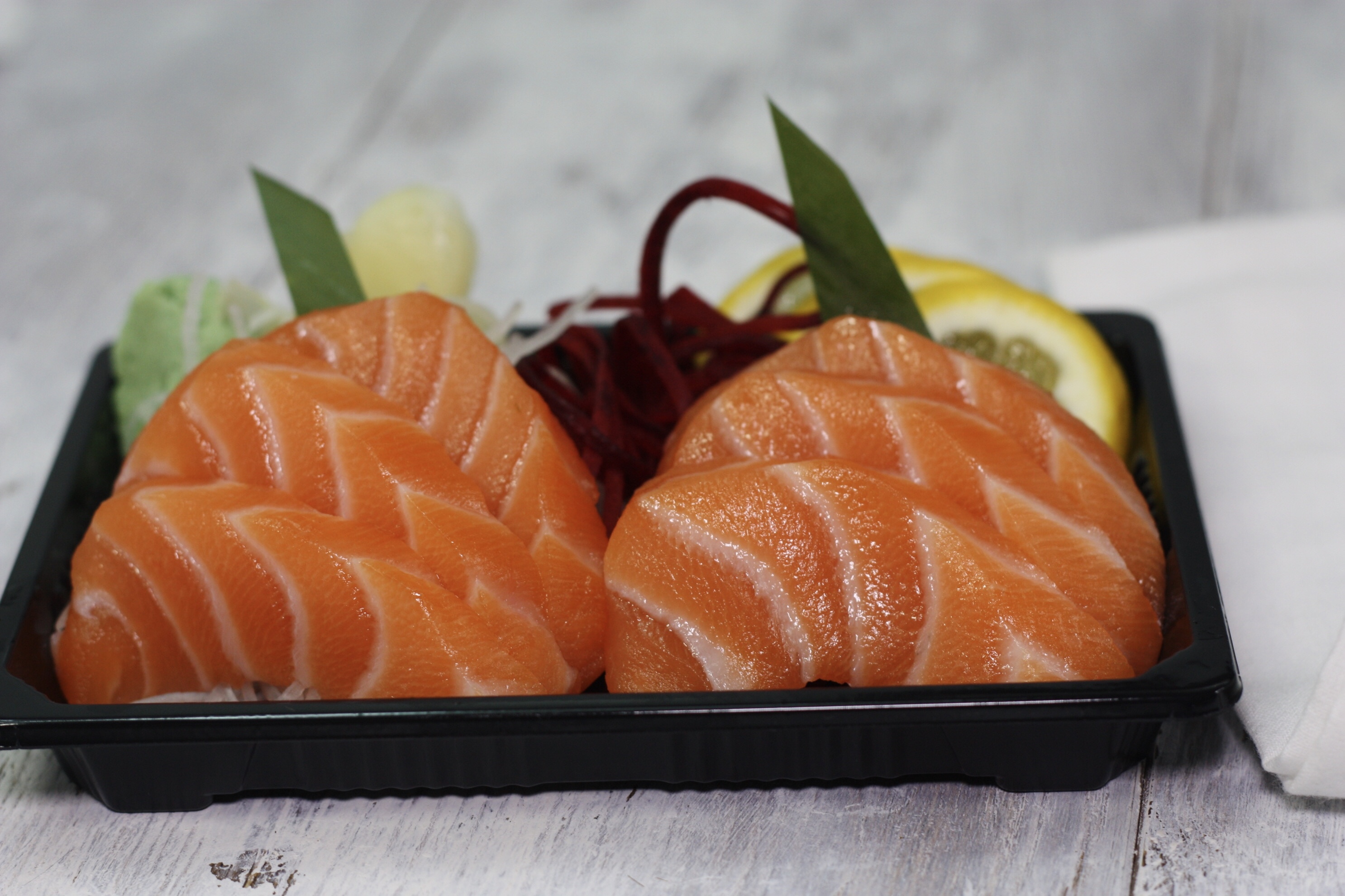 Order Salmon Sashimi (6pc) food online from Sushi N Grill store, Bakersfield on bringmethat.com