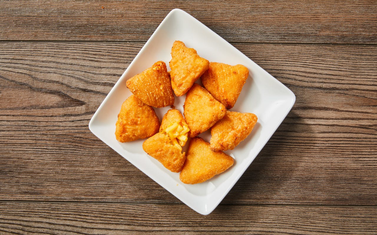 Order Mac & Cheese Bites - Side food online from Fox Pizza Den store, Aliquippa on bringmethat.com