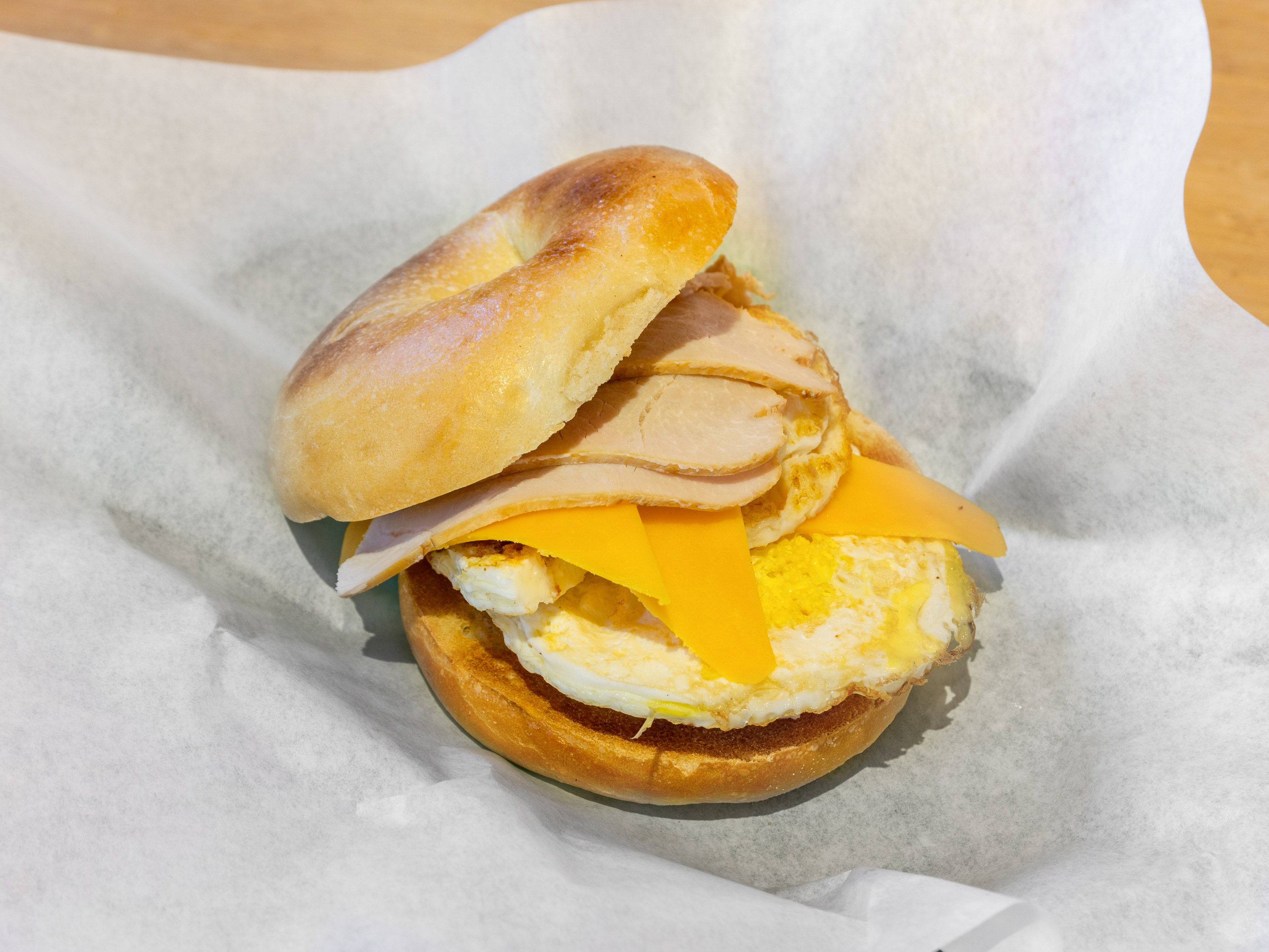 Order Bagel w/ Egg & Cheese food online from Base Cafe store, Chicago on bringmethat.com