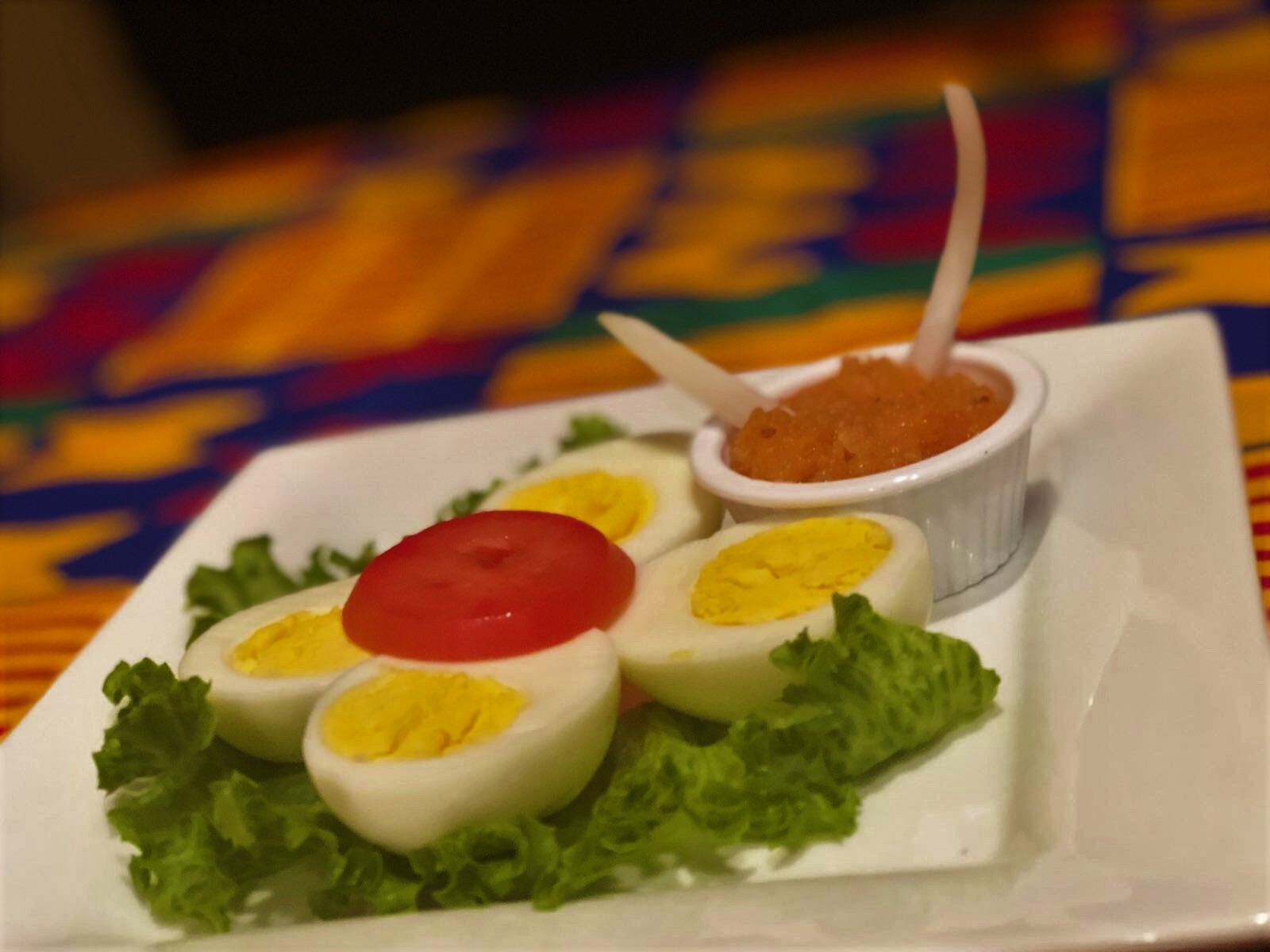 Order Spicy African Deviled Eggs food online from The Spice Grille store, Moorhead on bringmethat.com